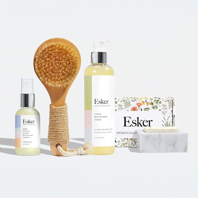 ESKER Everything Shower Gift Set Comes with our Dry Brush 2oz Firming Body Oil a Full Sized Clarifying Wash and our Aromatic Shower Steamer all Packaged in a Beautiful Floral Linen Pouch