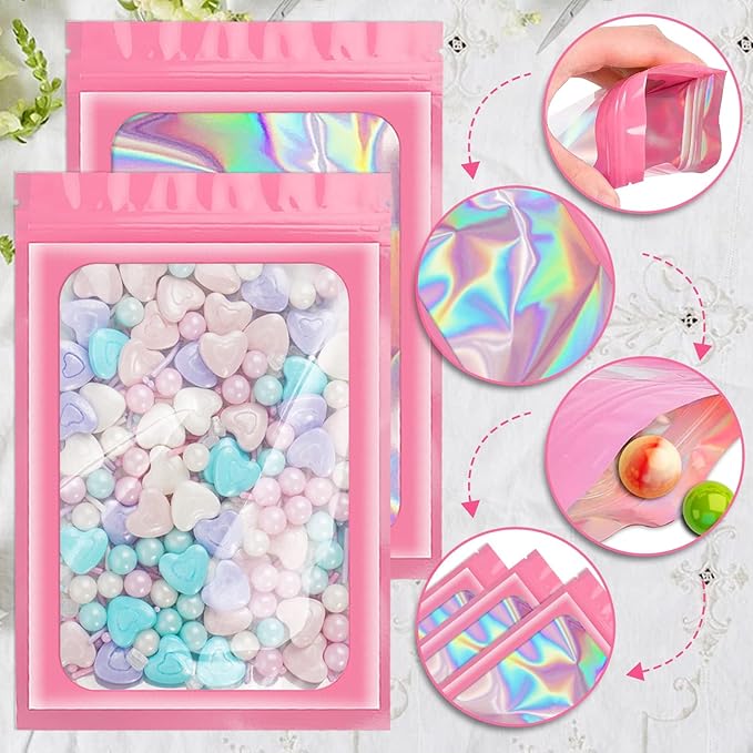 ANZNKU 100 Pcs Smell Proof Mylar Resealable Bags, Holographic Packaging Bags, Resealable Odor Foil Pouch Zip Bag with Clear Window for Food Storage and Lipgloss, Jewelry Lash(Pink, 5.5 x 7.9 Inch)