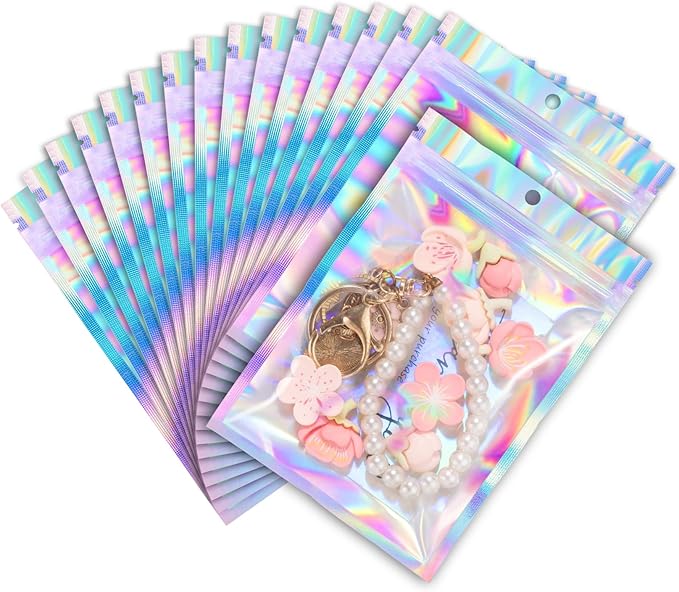ANZNKU 100 Pack Mylar Bags Reasealable Holographic Bags, Smell Proof Bag Zipper Pouches with Clear Window, Jewelry Candy Sealable Bag for Packaging Sample Party Favor (5.5 x 7.9 Inch)