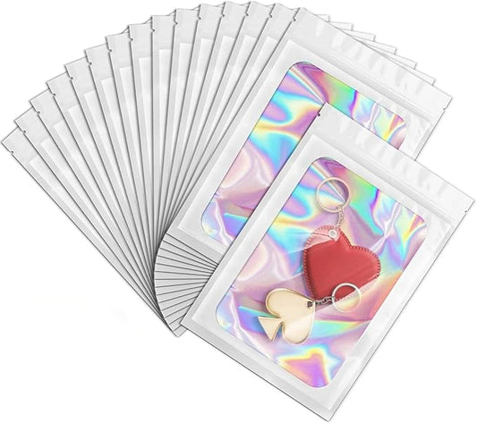 ANZNKU 100 Pack Mylar Bags Reasealable Holographic Bags, Smell Proof Bag Zipper Pouches with Clear Window, Jewelry Candy Sealable Bag for Packaging Sample Party Favor (White, 7.1 x 10.2 Inch)