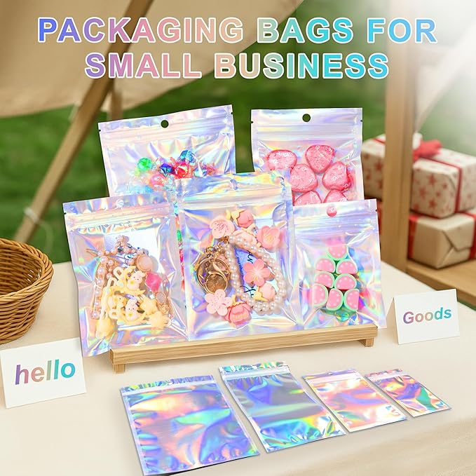 ANZNKU 100 Pack Mylar Bags Reasealable Holographic Bags, Smell Proof Bag Zipper Pouches with Clear Window, Jewelry Candy Sealable Bag for Packaging Sample Party Favor (3.9 x 7.1 Inch)