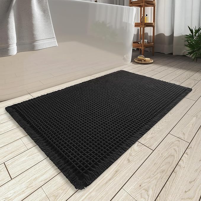 AMOAMI Upgraded Waffle Bath Mat, Super Absorbent Non Slip Bath Mats for Bathroom Floor, Machine Washable Bathroom Rugs with Tassels, Rubber Backed Bathroom Mats, Ultra Soft, 20" x 32", Black
